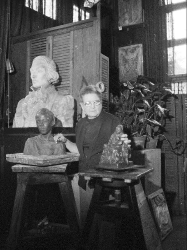 Angela Gregory in her studio in 1979 with the plasters versions of some her best known works